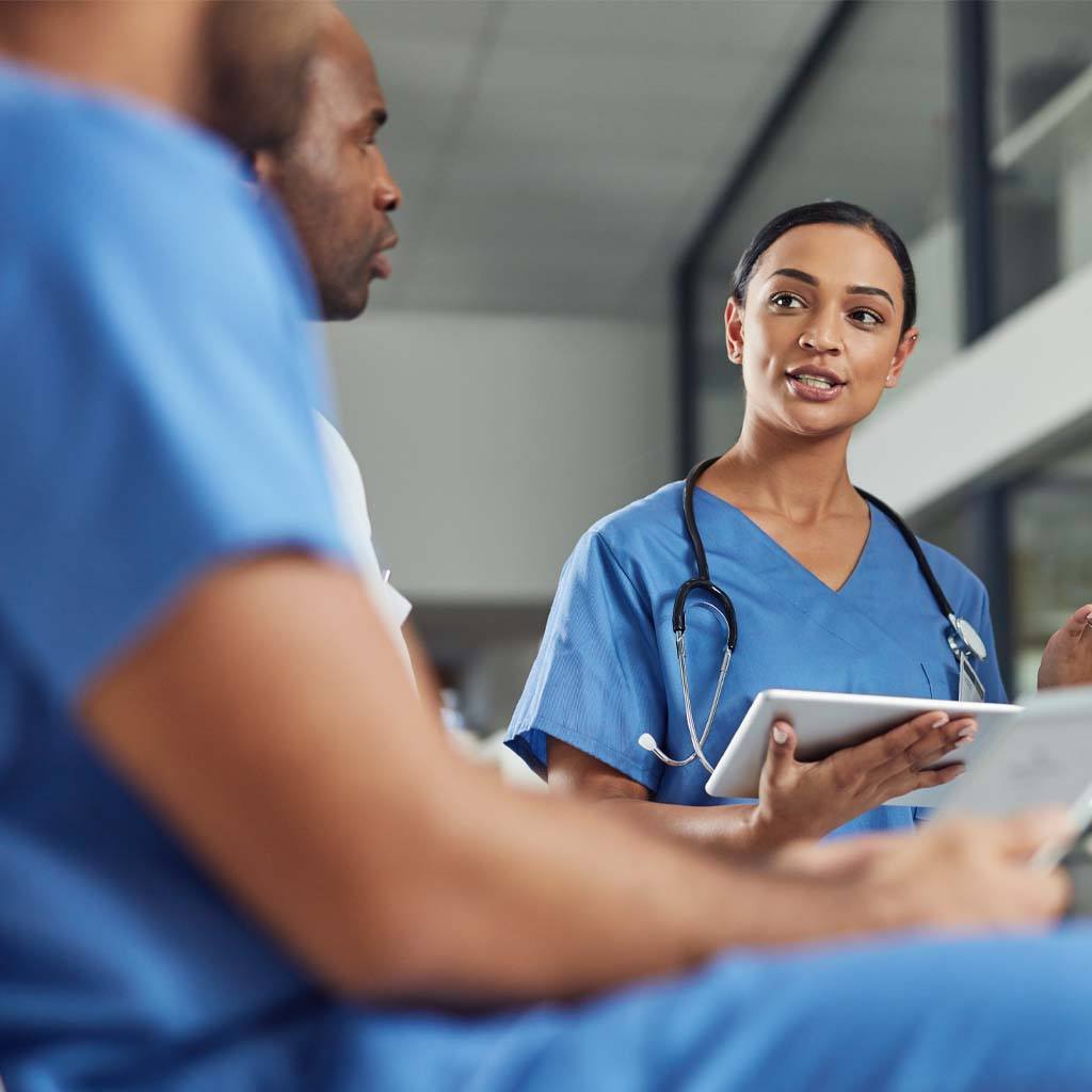 Shot of a group of medical practitioners having a discussion in a hospital.