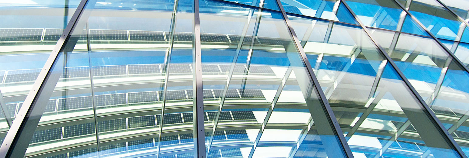 Reflections in windows and solar panels.