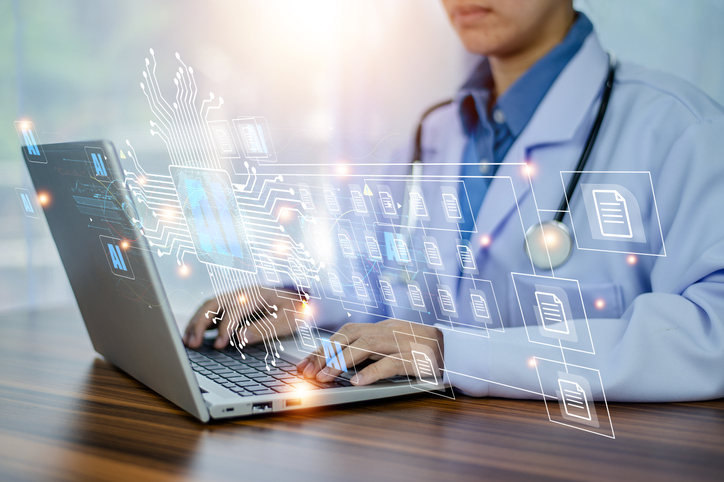 Male physician in white coat uses laptop. Image is overlaid with icons demonstrating the use of data.